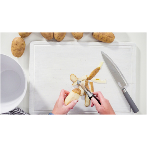 Flat,Lay.,Step,By,Step.,Peeling,Large,Yellow,Potatoes,With