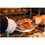 Chicken,Being,Cooked,Over,Coal